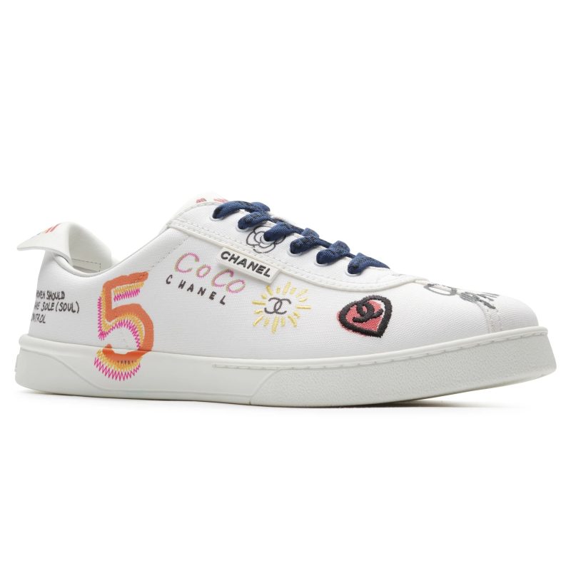 chanel x pharrell white canvas sneaker front side