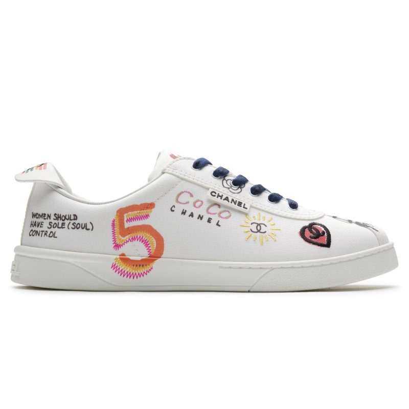 chanel x pharrell white canvas sneaker side