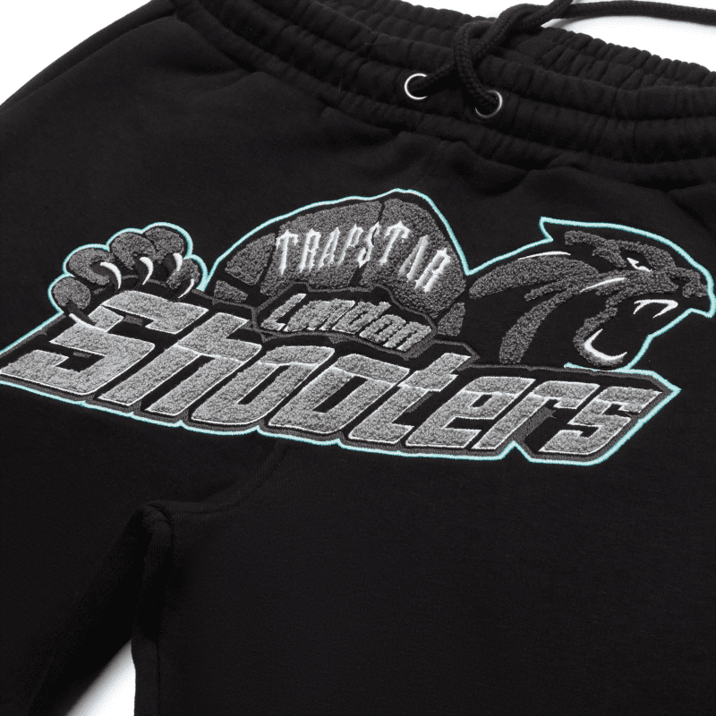 trapstar shooters black teal tracksuit logo